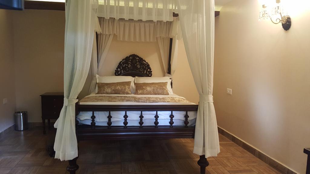 Casa Menezes - A Heritage Goan Homestay Bambolim Ruang foto